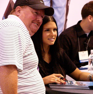 Patrick poses with a fan at a 2007 appearance. Used under CC BY-SA 2.0.